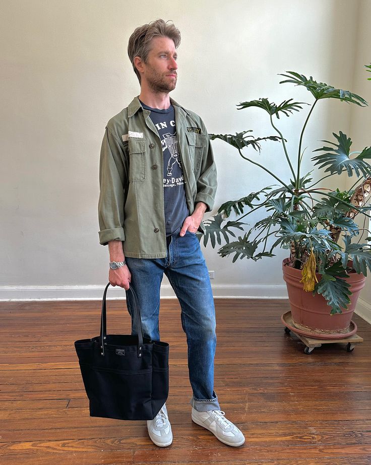 This versatile, fun tote is our best selling go-to for daily carry. Small batch handmade in our Omaha, NE studio using sturdy water repellent duck canvas and American full grain leather. WE ARE HANDMAKING MORE TOTES BUT THEY WILL NOT BE AVAILABLE UNTIL 12/20/2024. PLEASE USE OUR "NOTIFY ME" FEATURE (BELOW), AS WE'LL BE UPDATING THE SITE PERIODICALLY. ALSO, CONSIDER A GIFT CARD! Daily Carry, Canvas Leather Tote, Squeeze Pouch, Crochet Pouch, Tote Organization, Crochet Work, Knitting Bag, Omaha Nebraska, Duck Canvas