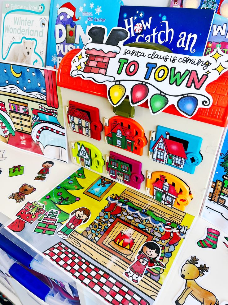 several children's books are displayed on a table