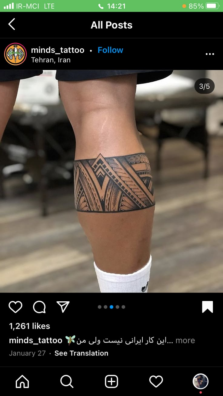 a person with a tattoo on their leg