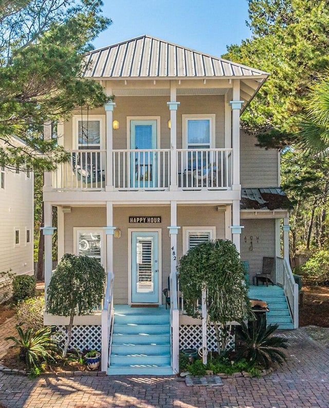 a house that has stairs leading up to it