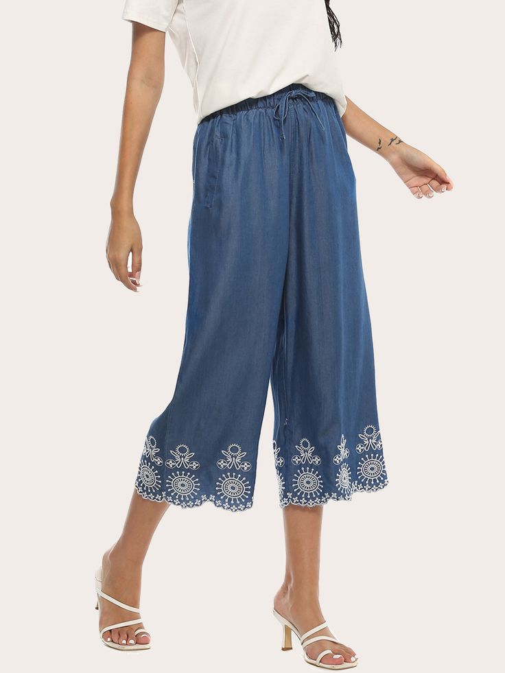 Women's Embroidered-Trim Denim Gaucho Pants Spring Embroidered Denim Blue Pants, Embroidered Denim Blue Casual Bottoms, Denim Blue Floral Embroidery Wide Leg Jeans, Casual Embroidered Denim Blue Bottoms, Embroidered Wide Leg Denim Blue Pants, Embroidered Denim Blue Pants, Wide Leg Denim Blue Jeans With Floral Embroidery, Non-stretch Denim Blue Bottoms With Floral Embroidery, Embroidered Wide Leg Denim Bottoms