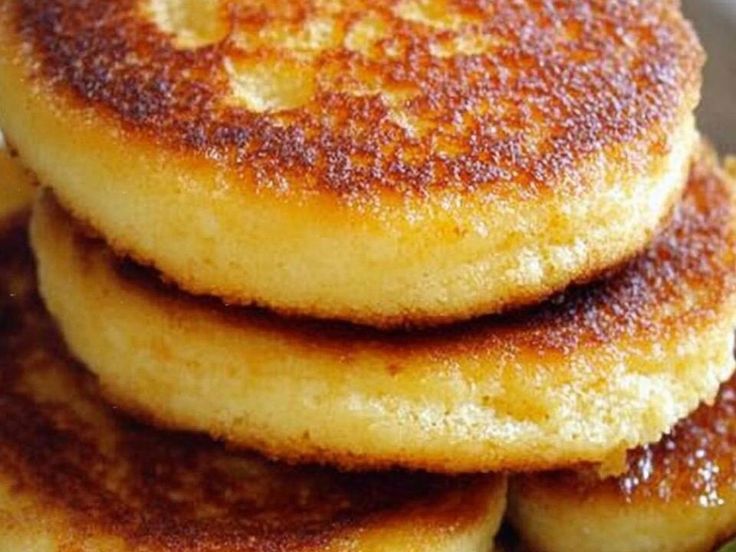 some pancakes are stacked on top of each other