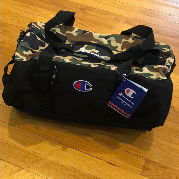 Nwt Champion Duffle Bag Camo And Black Brand New Never Used Perfect Bag Camouflage Casual Travel Bag, Casual Camouflage Travel Bag, Rectangular Camouflage Travel Bag, Casual Camouflage Rectangular Bags, Camouflage Functional Travel Bags, Casual Rectangular Camouflage Bags, Functional Camouflage Travel Bag, Camouflage Tote Bag For Travel, Functional Camouflage Bags For Everyday Use