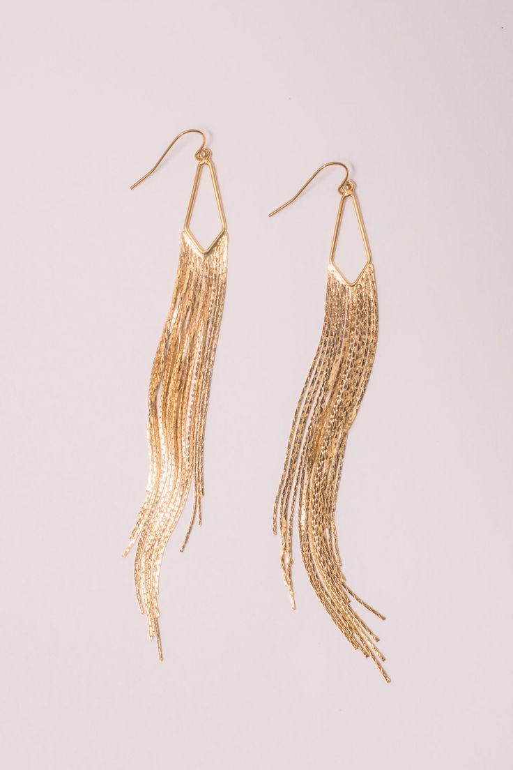 Hit the town or stay in and have a dance party with these lightweight gold sparklers. Graduated layers of sleek gold chain create this wearable fringe. Dimensions: Hangs 5" Materials: Alloy, 18k Gold Plating Ships in a branded jewelry pouch and box, perfect for gift giving! Graduated Layers, Gold Fringe, Dance Party, Jewelry Pouch, Gift Giving, Gold Plating, Gold Chain, Gold Chains, 18k Gold