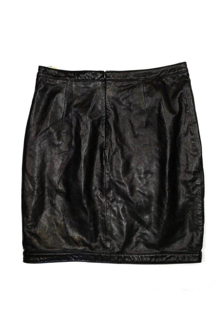 This edgy leather skirt is the perfect transitional piece to have in your closet. Made with a unique cut-out leather panel on the front. Wear it with tights and chic booties for a cool weather look! Size 2 100% lamb leather Back zip closure Above knee- mini Waist 29.5" Hips 36.5" Total length 19" Sleek Black Leather Pencil Skirt, Fitted Leather Skirt For Spring, Chic Black Leather Pencil Skirt, Leather Lined Skirt For Night Out, Leather Pencil Mini Skirt For Fall, Fitted Black Leather Mini Skirt, Black Leather Pencil Skirt For Night Out, Edgy Leather Skirt For Night Out, Edgy Leather Skirt For Work