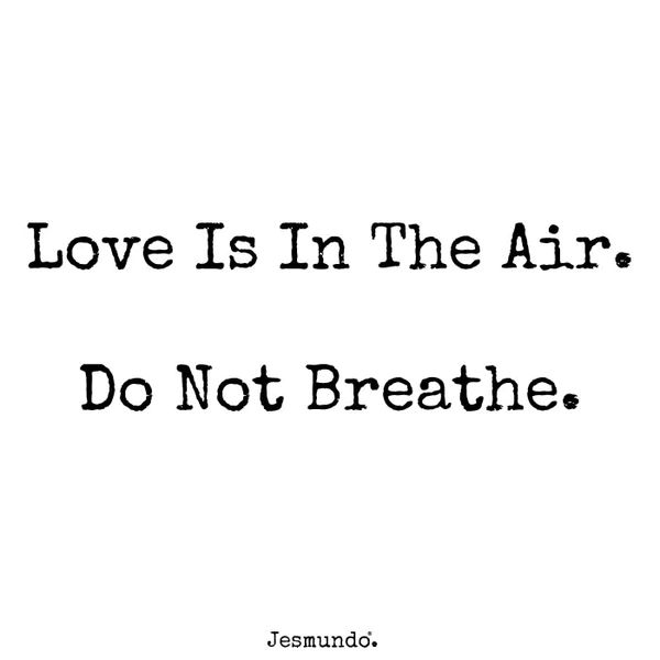 the words love is in the air, do not breathe on a white background with black lettering