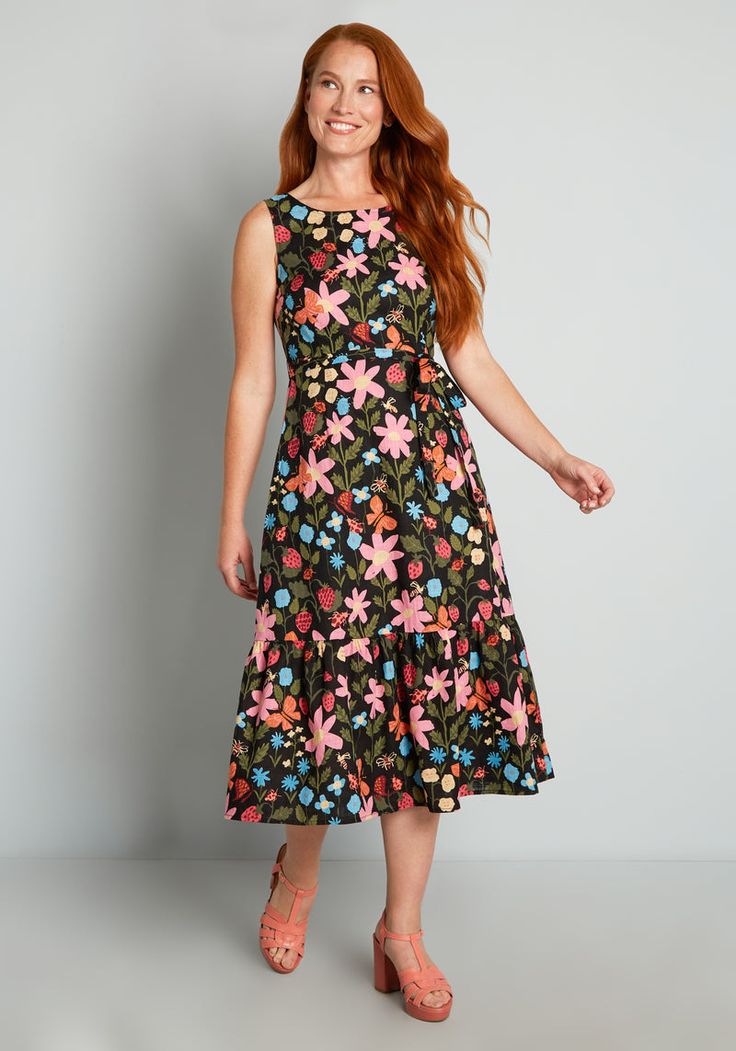 Inspired by vintage spring florals, this black midi dress from Aussie brand Princess Highway features an abundant burst of blooms in shades of pink and blue surrounded by lush greenery, blossoming strawberries, and a variety of cute creatures buzzing throughout. Made from a lightweight cotton weave, this sleeveless dress features a scoop neckline, a semi-fitted bodice, a removable and matching tie-waist belt, and a flowy midi skirt with a deep ruffle hemline. Strawberry Bouquet, Vintage Style Swimwear, Cute Red Dresses, Casual Dresses Plus Size, Wild Strawberry, Princess Highway, Midi Dress Plus Size, Spring Florals, Vintage Swimwear