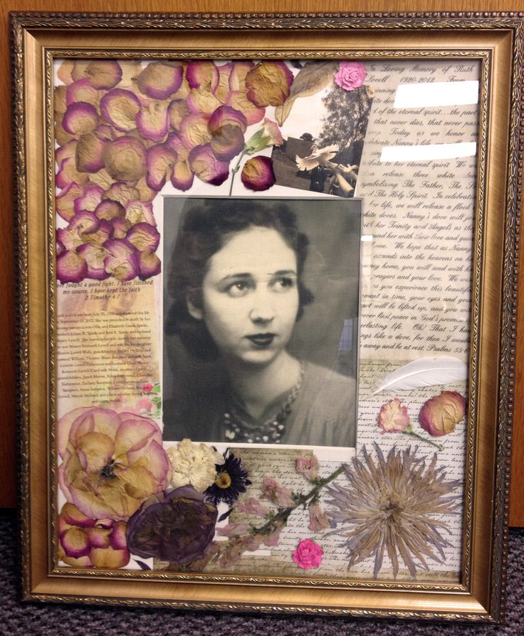 an old photo is surrounded by flowers and paper collages in a gold frame