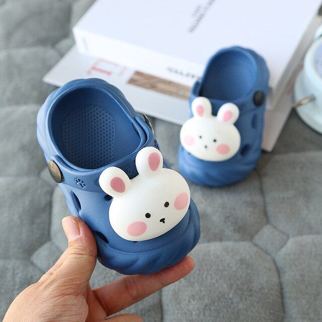 The Bunnies kid's clogs Cute Blue Non-slip Clogs, Playful Non-slip Slip-on Clogs, Playful Slide Clogs For Beach, Blue Non-slip Fun Clogs, Fun Blue Non-slip Clogs, Cute Summer Clogs For Playtime, Playful Clogs For Playtime, Summer Playtime Clogs With Round Toe, Playful Clogs With Round Toe For Playtime