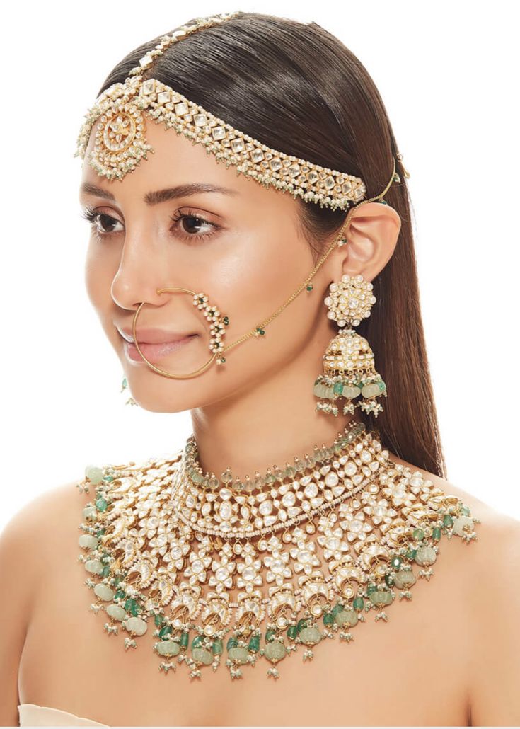 Open polki necklace set with russian emerald melons, green stone hangings, medium sized jhumkas, green nath and mint gre en mathapatti. Traditional Pista Green Jewelry For Wedding, Green Kundan Bridal Necklace Hand Set, Green Kundan Chandbali Jewelry, Green Temple Jewelry Sets With Latkans, Green Kundan Necklace With Latkans, Green Bollywood Kundan Necklace For Festivals, Ceremonial Green Kundan Necklace, Ceremonial Green Jhumkas With Latkans, Traditional Green Jhumkas For Ceremonial Occasions