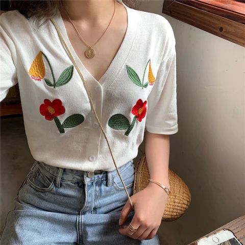 Sweet V-Neck Flowers Embroidered Shirts – Nada Outfit Land Spring Embroidered V-neck T-shirt, Casual V-neck T-shirt With Floral Embroidery, Cotton V-neck T-shirt With Floral Embroidery, Trendy Embroidered V-neck Tops, V-neck Cotton T-shirt With Floral Embroidery, Floral Embroidered Cotton V-neck T-shirt, Spring V-neck Embroidered Shirt, Casual V-neck Shirt With Floral Embroidery, White Embroidered V-neck Shirt