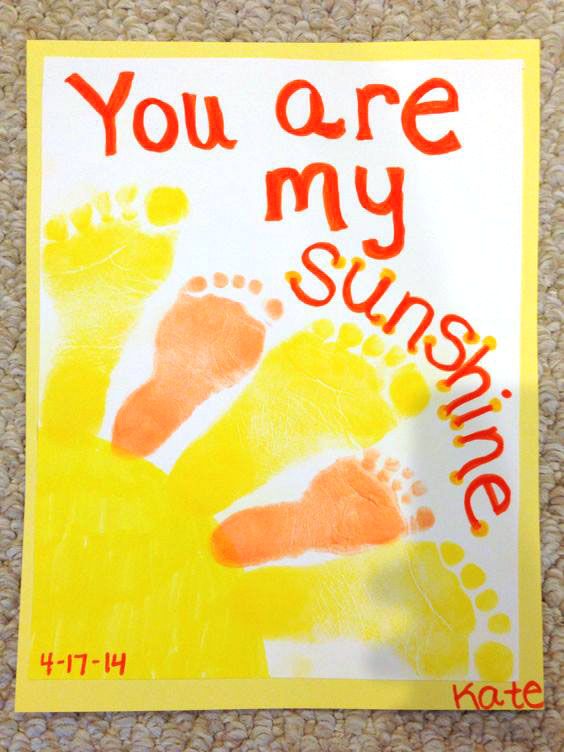 a child's hand and foot print with the words you are my sunshine written on it