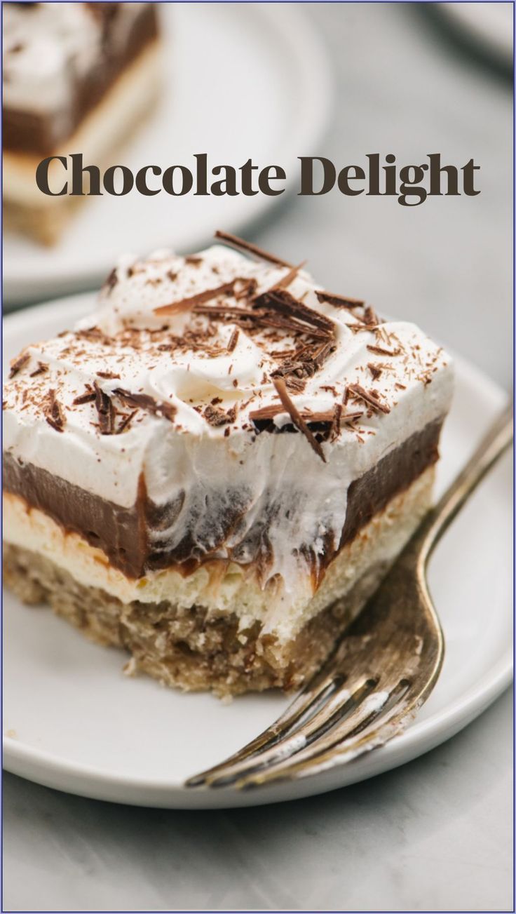 a close up of a piece of cake on a plate with the words homemade chocolate delight dessert