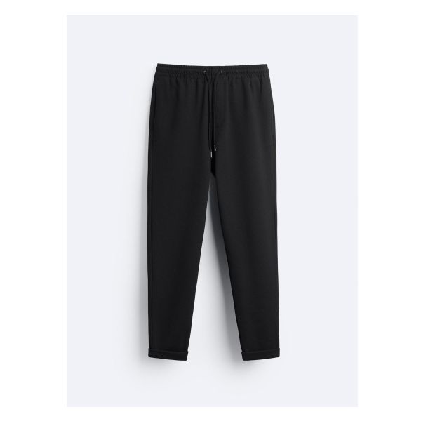 Pants with adjustable elastic drawstring waistband. Side pockets and back welt pockets. Turned up cuffs. Casual High-waisted Joggers With Elastic Waistband, Everyday Straight Pants With Drawstring, Everyday Straight Drawstring Pants, Casual Zara Ankle-length Cargo Pants, Zara Casual Ankle-length Cargo Pants, Zara Ankle-length Pants With Side Pockets, Casual Joggers With Elastic Cuffs For Work, Drawstring Tapered Leg Workwear Bottoms, Casual Pants With Elastic Cuffs And Straight Hem