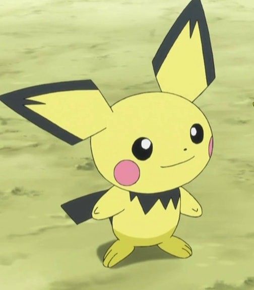 a pikachu is standing in the sand