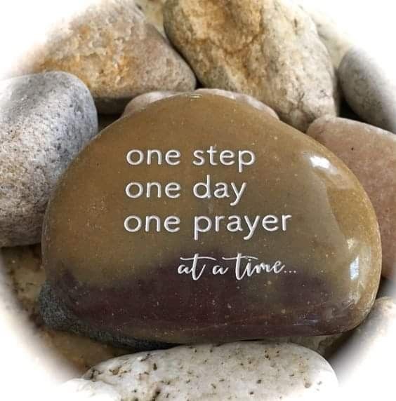 a rock with the words one step, one day, one prayer at a time written on it