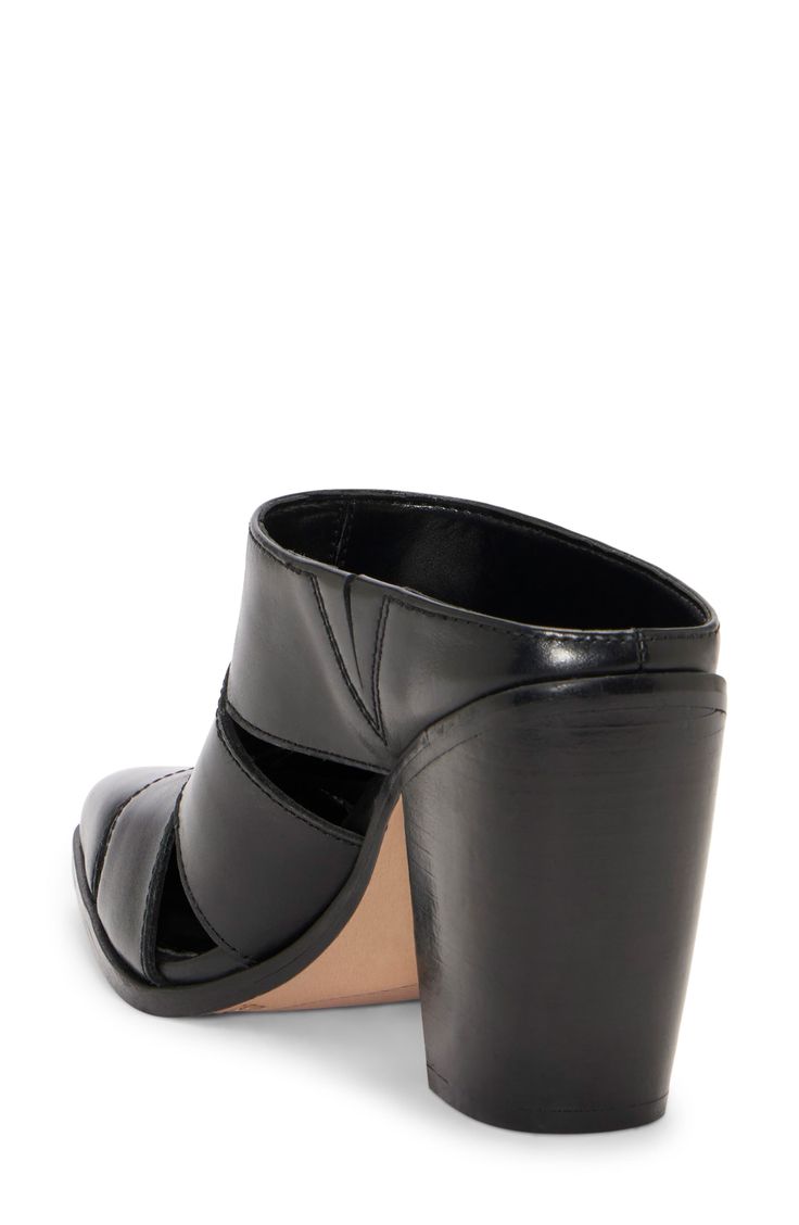 A strappy silhouette gives a breezy feel to this glossy leather mule that elevates you on a curved stacked heel. 3 1/2" heel Leather upper/synthetic lining/rubber sole Imported Modern Black Mules With Heel Loop, Black Mules With Heel Loop And Single Toe Strap, Calf Leather Mules With Rubber Sole, Open Toe, Open Toe Mules With Heel Loop, Medium Width, Synthetic Mules With Heel Loop, Medium Width, Leather Mules, Nordstrom Store, Stacked Heel, Anniversary Sale