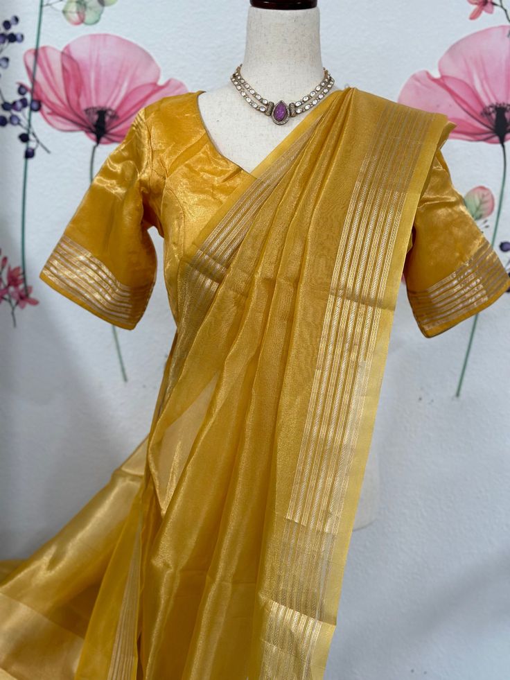 Amazing silk mark certified Benarasi tissue saree blouse size 36-40 fall & pico done. Comes with in-skirt Exclusive sarees from Haas Festive Saree With Sheer Dupatta In Slub Silk, Gold Slub Silk Sharara, Slub Silk Saree With Sheer Dupatta, Gold Slub Silk Sharara For Navratri, Navratri Pre-draped Tussar Silk Saree With Sheer Dupatta, Gold Anarkali Style Cotton Silk Pre-draped Saree, Gold Cotton Silk Anarkali Set With Traditional Drape, Gold Semi-stitched Anarkali Set In Cotton Silk, Formal Art Silk Pre-draped Saree For Diwali