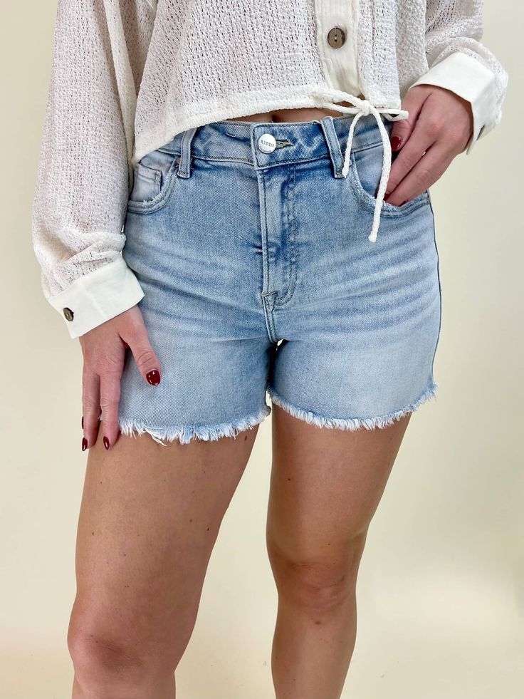 Risen brand light washed high rise denim shorts with a frayed bottom hem. Zip fly Traditional 5 pocket styling Rise: 10.25” Inseam: 3.5” Fabric: 74% Cotton 24% Polyester 2% Spandex Brand: Risen Jeans (RDS6139light) Model is 5’8” and wearing size M Risen Jeans, Cap Sleeve Sweater, Denim Jewelry, Linen Romper, High Rise Denim Shorts, Large Dress, Denim Midi Skirt, High Rise Shorts, High Rise Denim