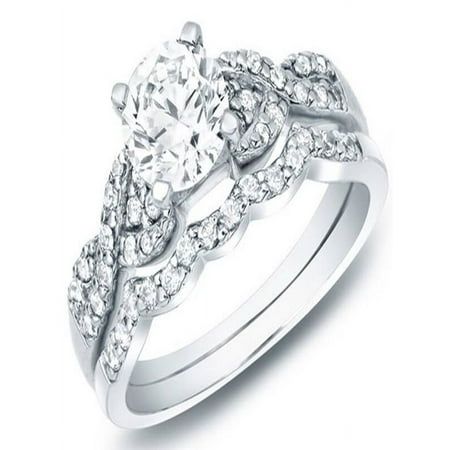 a white gold engagement ring set with diamonds