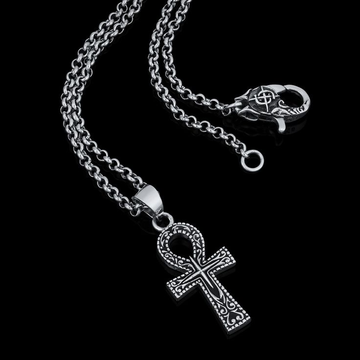 The Ankh symbol or “Key of Life”, is an Ancient Egyptian symbol that represents eternal life. Handcrafted from solid silver its unique design is also associated with protection and good fortune to those who possess it. Handcrafted Sterling Silver pendant and clasp. Comes on a 55cm x 2.5mm gauge stainless-steel cable-chain. Engraved Spiritual White Gold Jewelry, Spiritual Engraved White Gold Jewelry, Engraved White Gold Spiritual Jewelry, Symbolic Metal Cross Necklace, Symbolic Stainless Steel Pendant Jewelry, Symbolic White Gold Metal Necklace, Handmade Symbolic Jewelry, Symbolic Round Pendant Necklace, Spiritual Oxidized Metal Jewelry