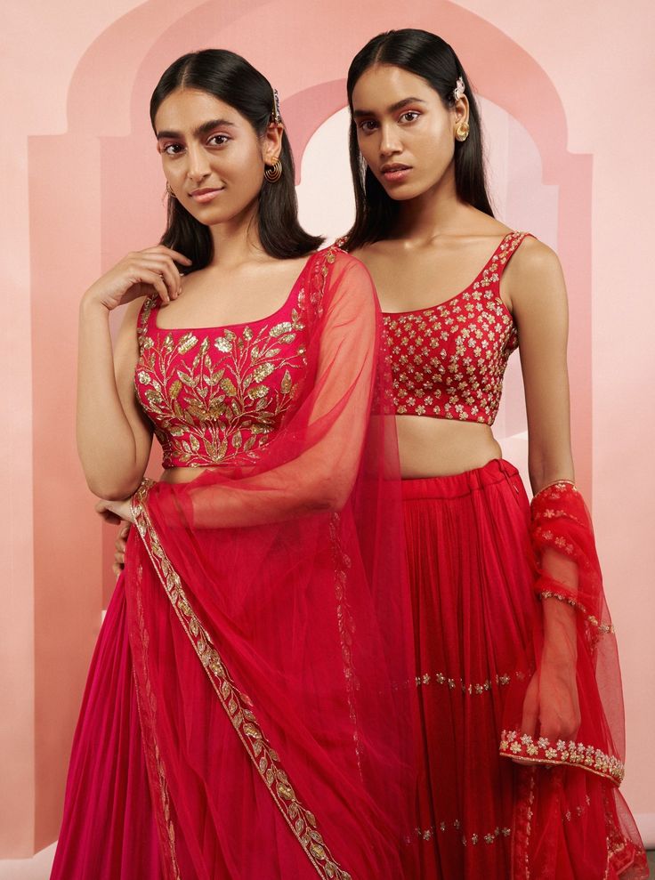 Editor's Note A Lehenga Set With Heavy Salli Jalli Blouse And A Half Kali Salli Lehenga With Border Dupatta. Fabric: Crepe And Net Color: Pink Care: Dry Clean Only About the Designer Ease is a minimalistic label based in Mumbai. For sisters Khushboo and Vidhi, it is a unique labor of love that amalgamates various elements of traditional Indian style with western silhouettes. Ease endeavor is to provide maximum comfort without comprising on sophistication and style. Semi-stitched Sets For Reception And Festivals, Floor-length Sets With Intricate Embroidery For Diwali, Fitted Embroidered Sets For Reception, Fitted Anarkali Sets With Intricate Embroidery, Unstitched Art Silk Sets For Reception, Floor-length Sets With Resham Embroidery For Festive Occasions, Floor-length Festive Sets With Resham Embroidery, Festive Floor-length Sets With Resham Embroidery, Festive Sets With Intricate Embroidery For Reception