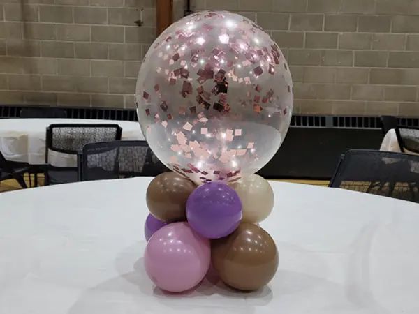 some balloons that are on top of a table