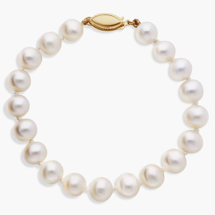 Nearly round, these freshwater cultured pearls are strung securely on a 6.5" hand-knotted silk blend cord and secured with a 14k yellow gold safety clasp. Classic Single Strand Akoya Pearl Bracelet, Luxury Single Strand Pearl Bracelet With Round Beads, Luxury Single Strand Pearl Bracelet, Single Strand Pearl Bracelet, Single Strand Round Akoya Pearl Bracelet, Classic Yellow Gold Single Strand Pearl Bracelet, Classic Yellow Gold Bracelet With Pearl Drop, Classic Yellow Gold Bracelets With Pearl Drop, Single Strand Akoya Pearl Bracelet