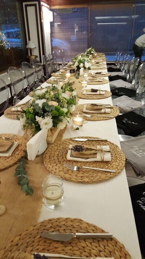 a long table is set with place settings