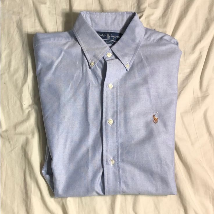 Great Condition Never Worn! Light Blue Business Casual Shirt With Button Closure, Preppy Blue Shirt With Button Closure, Preppy Blue Button-up Tops, Blue Casual Tops For Business Casual, Ralph Lauren Casual Shirt For Business Casual, Preppy Blue Top With Buttons, Ralph Lauren Button-up Tops For Business Casual, Preppy Ralph Lauren Button-up Tops, Light Blue Button-up Business Casual Top