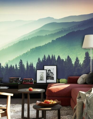 a living room with mountains and trees painted on the wall