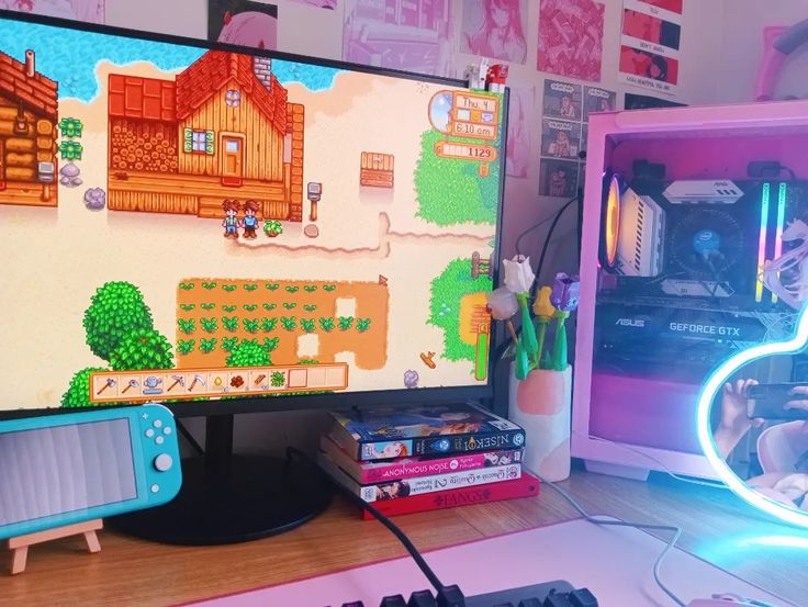 a computer desk topped with a monitor and keyboard