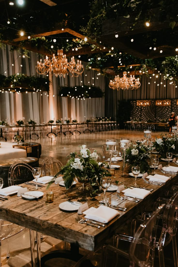 the tables are set with place settings for dinner