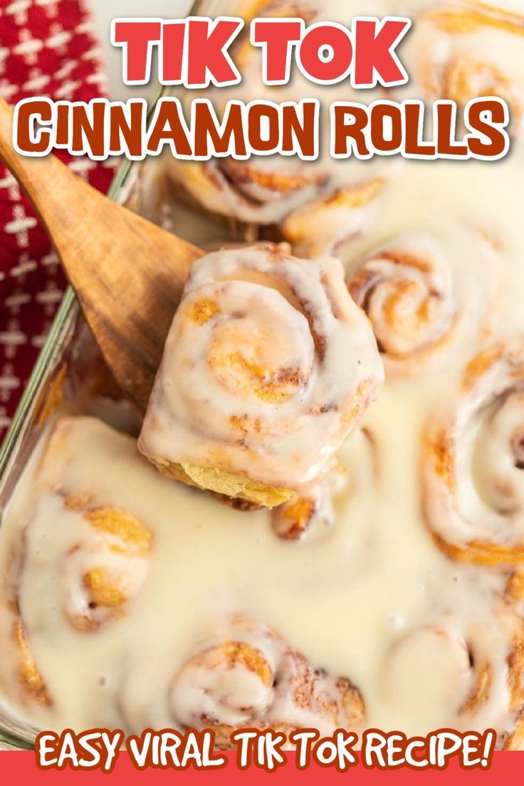 cinnamon rolls with icing in a glass pan