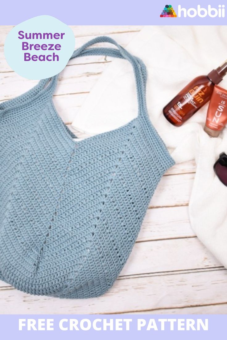 a crochet bag, sunglasses and sunscreen on a white wooden background with text that reads summer breeze beach free crochet pattern