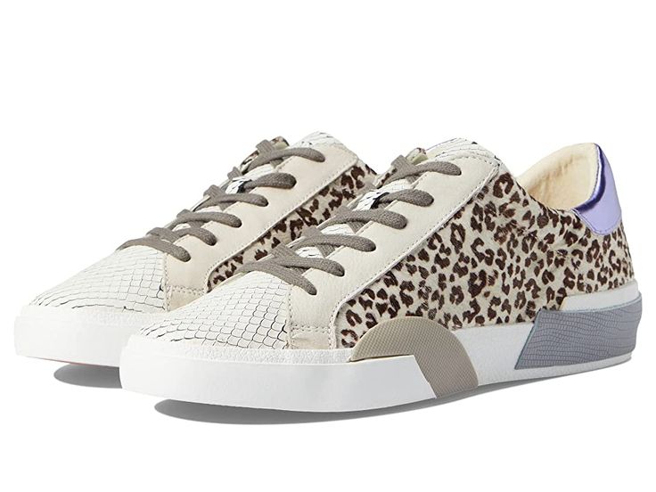 Dolce Vita Zina - Women's Shoes : White Leopard Calf Hair : Go for the gusto with the color block, leather Dolce Vita Zina sneakers with lace up closure, leather lining, and lightly padded leather and cotton footbed. Padded, cotton collar with thick midsole. Textured, synthetic outsole. Imported. Measurements: Weight: 12 oz Product measurements were taken using size 9, width M. Please note that measurements may vary by size. Weight of footwear is based on a single item, not a pair. Casual Sneakers With Contrast Sole For Fall, Casual Fall Sneakers With Contrast Sole, Modern Lace-up Sneakers For Fall, Modern Low-top Sneakers For Fall, Urban Low-top Sneakers For Fall, Urban Spring Sneakers With Speckled Midsole, Modern Fall Sneakers With Rubber Sole, Modern Slip-on Sneakers For Fall, Urban Sneakers With Contrast Sole For Fall