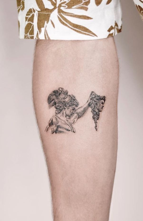 a person with a tattoo on their leg