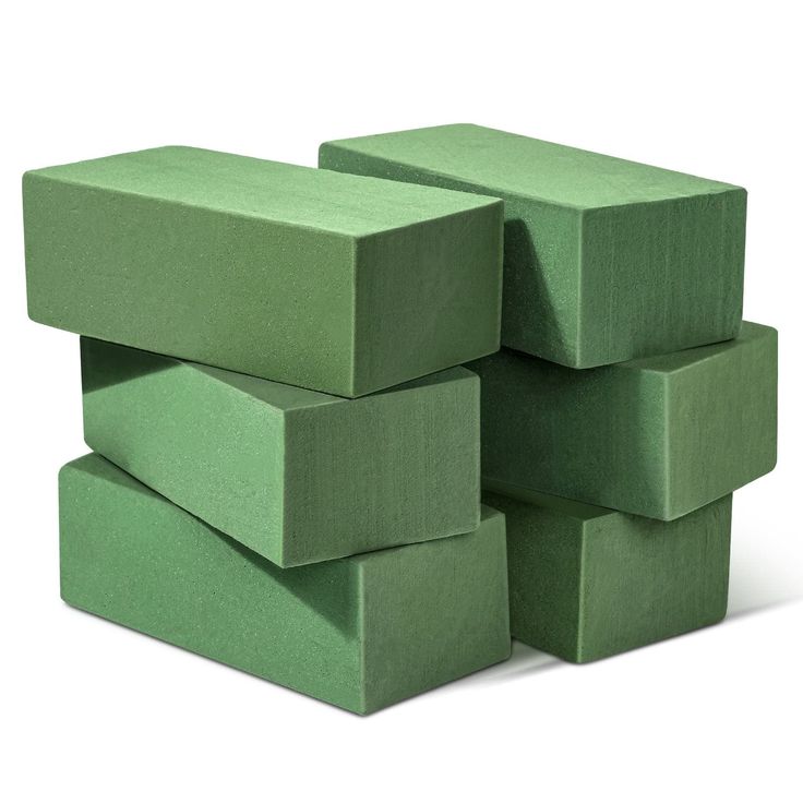 a stack of green cubes sitting on top of each other