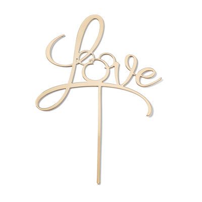 a cake topper with the word love on it