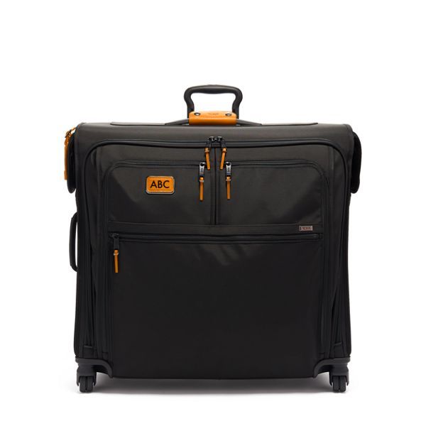 Our longer, full-feature wheeled garment bag brings complete convenience to traveling with suits, coats, and dresses. It's designed to hold up to six TUMI hangers and includes a shoe pocket that holds up to three pairs. A large exterior compartment allows for additional clothing. Part of our Alpha 3 Collection, iconic business and travel pieces that bring together innovative design, superior performance, and best in class functionality. Select styles come outfitted with a colorful TUMI Accents K Elegant Travel Bag With Leather Trim For Overnight Trips, Elegant Leather Trim Travel Bag For Overnight Trips, Elegant Luggage With Leather Trim For Travel, Elegant Travel Bag With Luggage Sleeve For Overnight Trips, Elegant Luggage With Sleeve For Trip, Elegant Luggage For Overnight Trips, Elegant Black Luggage For Overnight Trips, Elegant Black Travel Bag For Trips, Elegant Luggage With Leather Trim For Business Trips