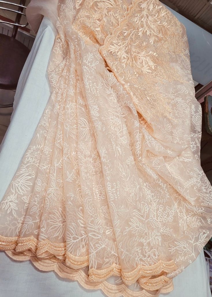 Elegant light peach colour  Dhakai Muslin saree with al over thread work. Border and pallu of the saree have been beautifully scalloped with cut dana. Prestigious Dhakai muslin saree is must have to your collection. This saree can be worn in any festival with confidence. Please note: colour might slightly vary due to light effects. Muslin Saree, Peach Saree, Light Peach Color, Peach Colour, Traditional Indian Outfits, Saree Photoshoot, Light Peach, Thread Work, Pure Silk Sarees