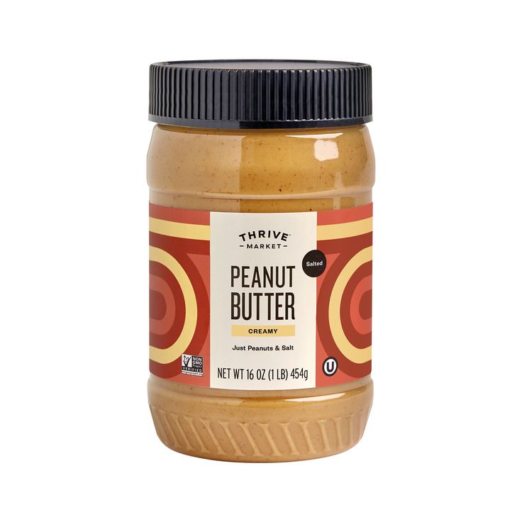 peanut butter in a jar on a white background