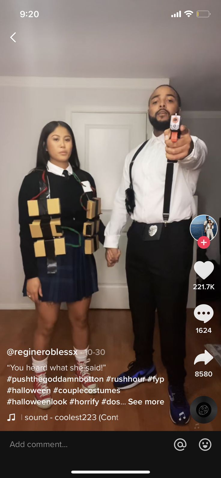 a man and woman dressed in costume standing next to each other holding up cell phones