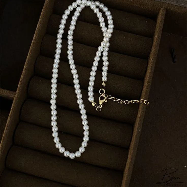 Bjux - Imitación Shi collar de perlas de diseño francés otoño e invierno suéter de la cadena de la clavícula de acero de titanio Alloy Pearl Necklace As A Gift, Alloy Pearl Necklace With Clavicle Chain As Gift, Pearl Necklace With Clavicle Chain As Gift, Elegant Alloy Necklace With Pearl Charm, Elegant Alloy Pearl Chain Necklace, Elegant Alloy Chain Necklace With Pearl Chain, Pearl White Clavicle Chain Choker Necklace, Pearl White Pearl Clavicle Chain Necklace, Pearl Clavicle Chain Necklace With Round Beads