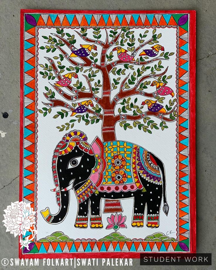 an elephant painted on the side of a wall next to a tree with leaves and flowers