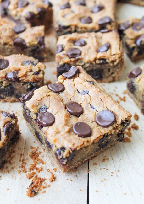 chocolate chip cookie bars cut into squares on a cutting board