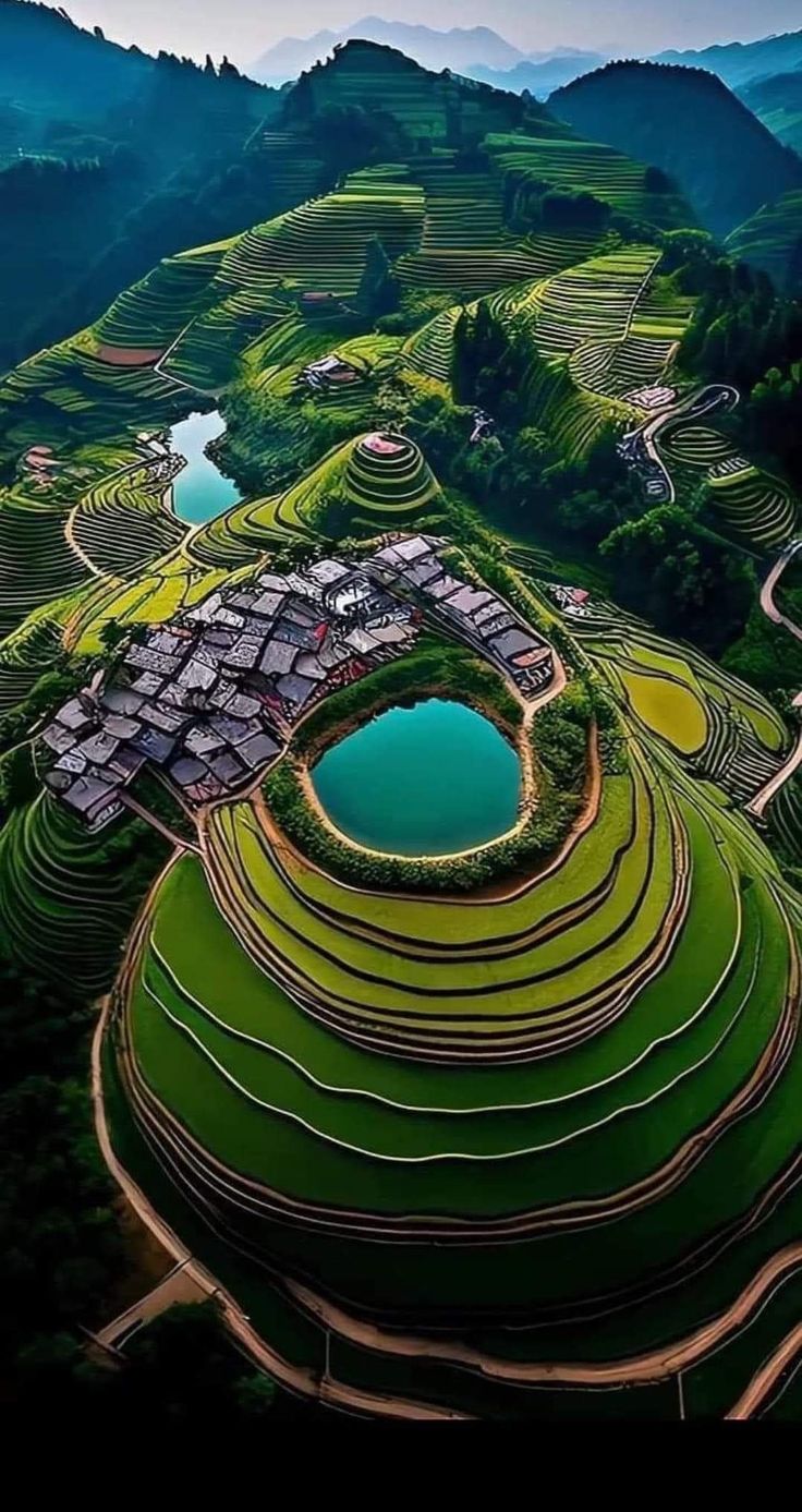 an aerial view of the terraces and water