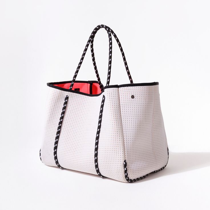 The cool, everyday bag that’s perfect for work, gym, beach, traveling, and everything in between. Trendy White Large Capacity Beach Bag, Trendy Large Capacity White Beach Bag, Casual White Gym Bag With Large Capacity, Large Capacity White Shoulder Bag For Summer, Sporty White Shoulder Bag With Large Capacity, Casual Tote Gym Bag For Weekend, White Large Capacity Shoulder Bag For Weekend, Trendy White Bag For Weekend, Sporty Large Capacity Shoulder Bag For Weekend