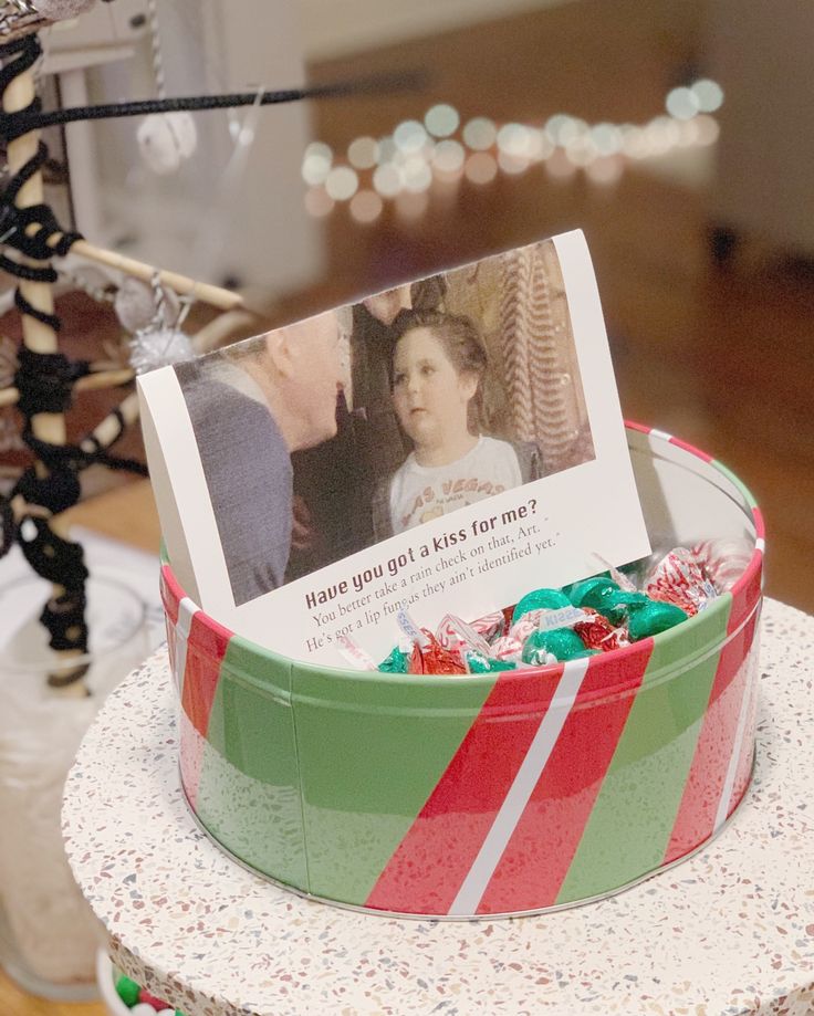 a cake with candy and a photo on it