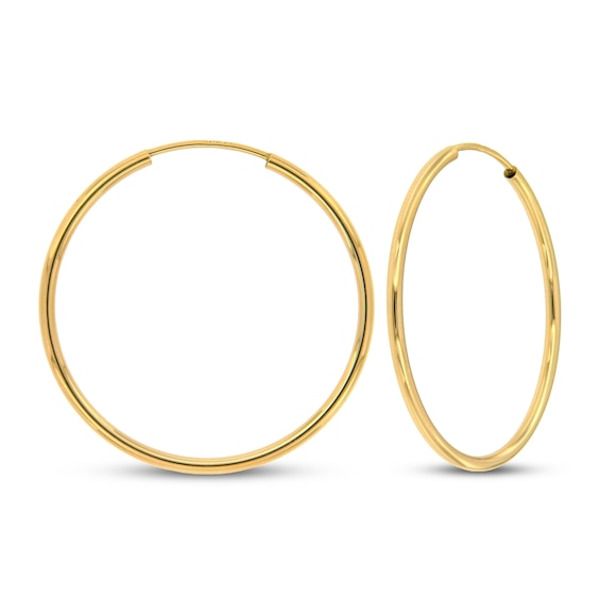 These continuous hoop earrings are fashioned in 14K yellow gold and are a stylish addition to her jewelry collection. The high polish finish gives extra shine, and the earrings measure 1.5x30mm and secure with endless backs. Gold Layered Bracelets, Pearl Diamond Jewelry, Cross Jewelry Necklace, Fan Jewelry, Tennis Bracelet Diamond, Cross Jewelry, Accessories Jewelry Earrings, Diamond Fashion, High Jewelry